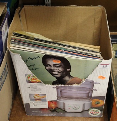 Lot 553 - A box of assorted LPs, to include George...