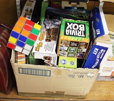Lot 554 - A box of miscellaneous children's toys and...