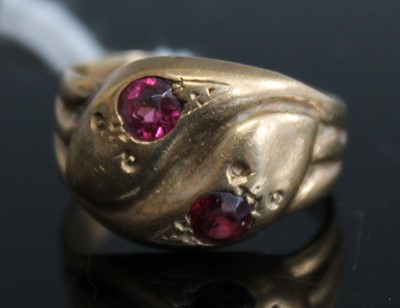 Lot 356 - A 9ct gold snake ring, each snake head set...