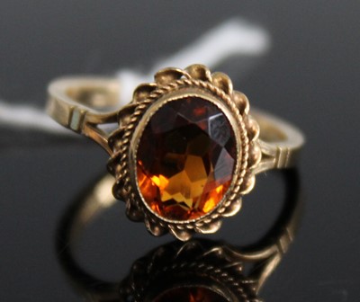 Lot 381 - A 9ct gold orange citrine set dress ring, 2.5g,...