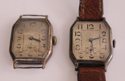 Lot 366 - A gents silver cased tank watch having manual...