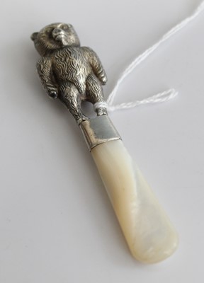 Lot 376 - A modern silver and mother of pearl baby's...