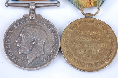 Lot 53 - A WW I British War and Victory pair, naming...