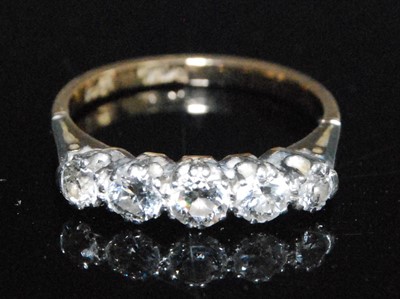 Lot 2548 - A yellow and white metal diamond five-stone...