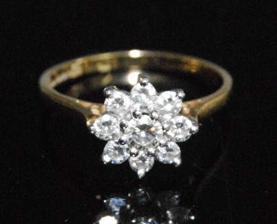 Lot 2549 - An 18ct yellow and white metal diamond...