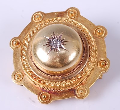 Lot 2667 - A Victorian yellow metal boss shaped target...