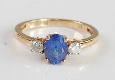 Lot 2673 - An 18ct gold, tanzanite and diamond set dress...