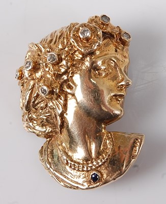 Lot 2726 - A contemporary 9ct gold diamond set portrait...