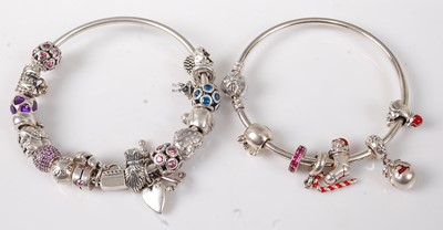 Lot 2735 - A Pandora silver bangle containing a...