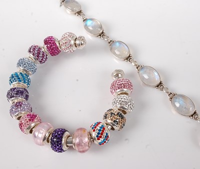 Lot 2737 - A Lovelinks silver torc bangle with various...