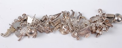 Lot 2744 - A silver curblink bracelet containing a large...