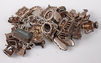 Lot 2745 - A silver curblink bracelet containing a large...