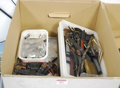 Lot 407 - A box of assorted watch accessories, largely...