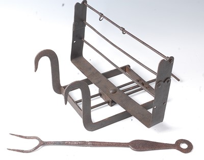 Lot 340 - * An 18th century wrought iron lark spit,...