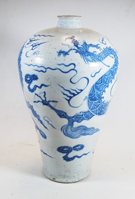 Lot 2 - A Chinese blue & white glazed stoneware...