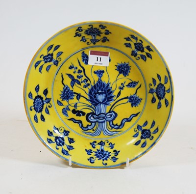Lot 11 - A Chinese export yellow and blue glazed...