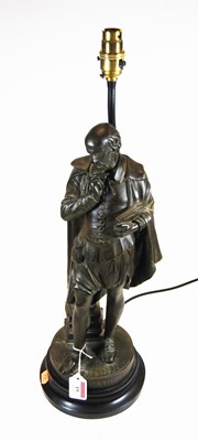 Lot 19 - A 20th century cast metal table lamp in the...