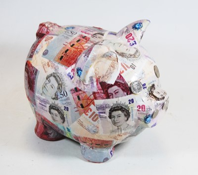 Lot 25 - A 20th century ceramic piggy bank, with 10p...