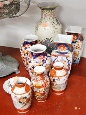 Lot 67 - A pair of Japanese porcelain vases in the...