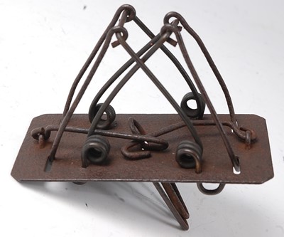 Lot 372 - * An early 20th century iron double loop mole...