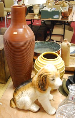 Lot 104 - A 20th century ceramic model of a dog, height...