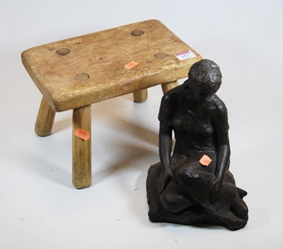 Lot 117 - A bronzed figure of a seated woman, height...