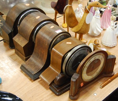 Lot 138 - An early 20th century oak cased mantel clock,...