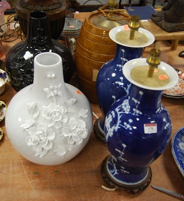 Lot 170 - A pair of Chinese Prunus pattern baluster...