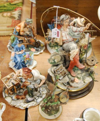 Lot 176 - A Capodimonte figure of a fisherman, together...