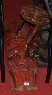 Lot 206 - A large tribal style wall mask together with a...