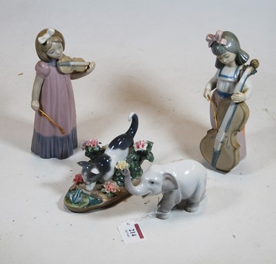 Lot 214 - A Lladro Spanish porcelain figure of a kitten...