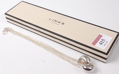 Lot 415 - A Links of London silver heavy pendant on...