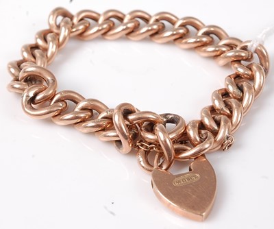 Lot 432 - A 9ct gold hollow curblink bracelet, with...