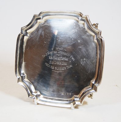 Lot 281 - A George VI silver card waiter, of shaped...