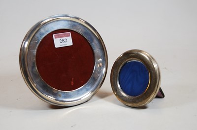 Lot 282 - An Edwardian silver clad easel photograph...