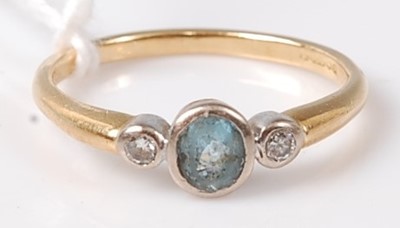 Lot 438 - An 18ct gold aquamarine and diamond dress ring,...