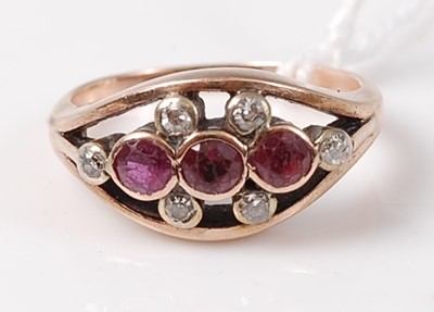 Lot 442 - A 9ct gold, ruby and diamond dress ring, the...