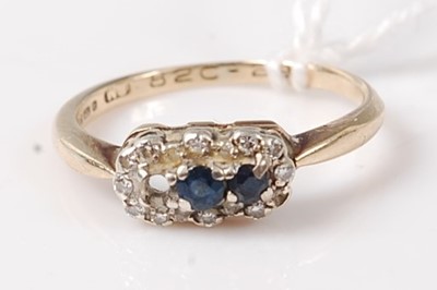 Lot 448 - A 9ct gold, sapphire and diamond dress ring...