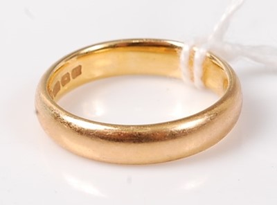 Lot 449 - A 22ct gold wedding band, 5.4g, size K/L