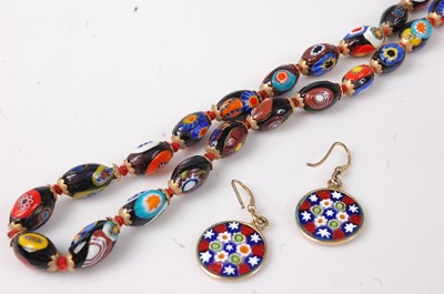 Lot 454 - A beaded Venetian glass necklace, with brass...