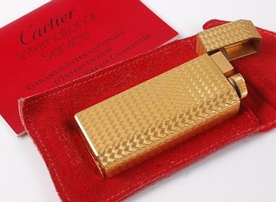 Lot 465 - A Must de Cartier engine turned gold plated...