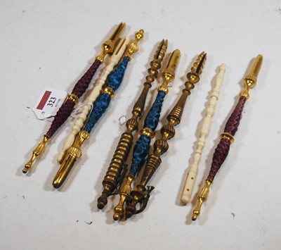 Lot 323 - A 19th century turned ivory face screen handle...