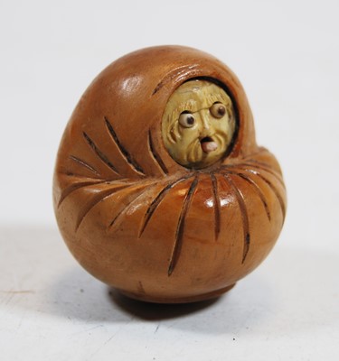 Lot 329 - A novelty boxwood okimono