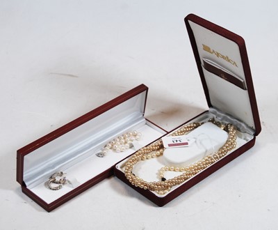 Lot 343 - A simulated pearl ropetwist three strand...