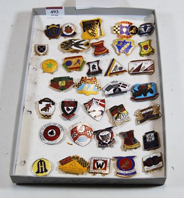 Lot 493 - A collection of enamel Speedway pin badges,...