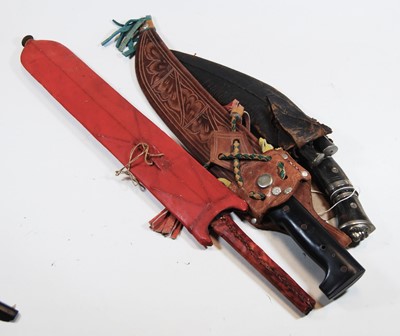 Lot 486 - A Nepalese tourist kukri knife with leather...