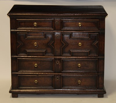 Lot 2480 - An antique oak and elm chest, in the Jacobean...