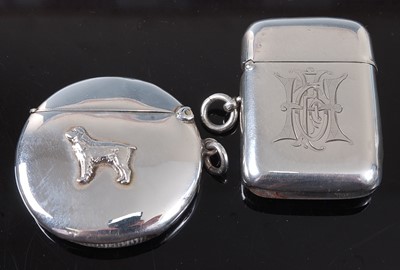 Lot 2075 - An Edwardian silver vesta, of hinged circular...