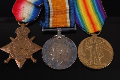 Lot 58 - A WW I trio to include 1914-15 Star, naming...