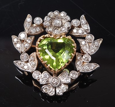 Lot 2210 - A yellow and white metal, peridot and diamond...